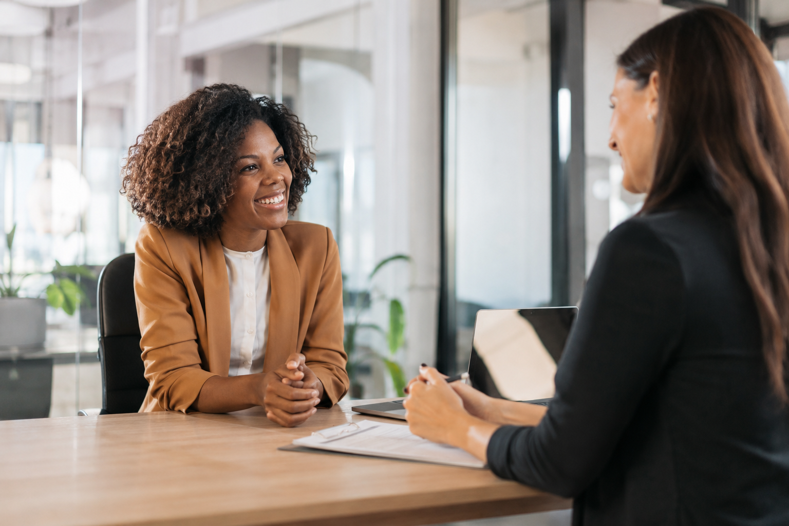 Friendly hiring conversation between professionals